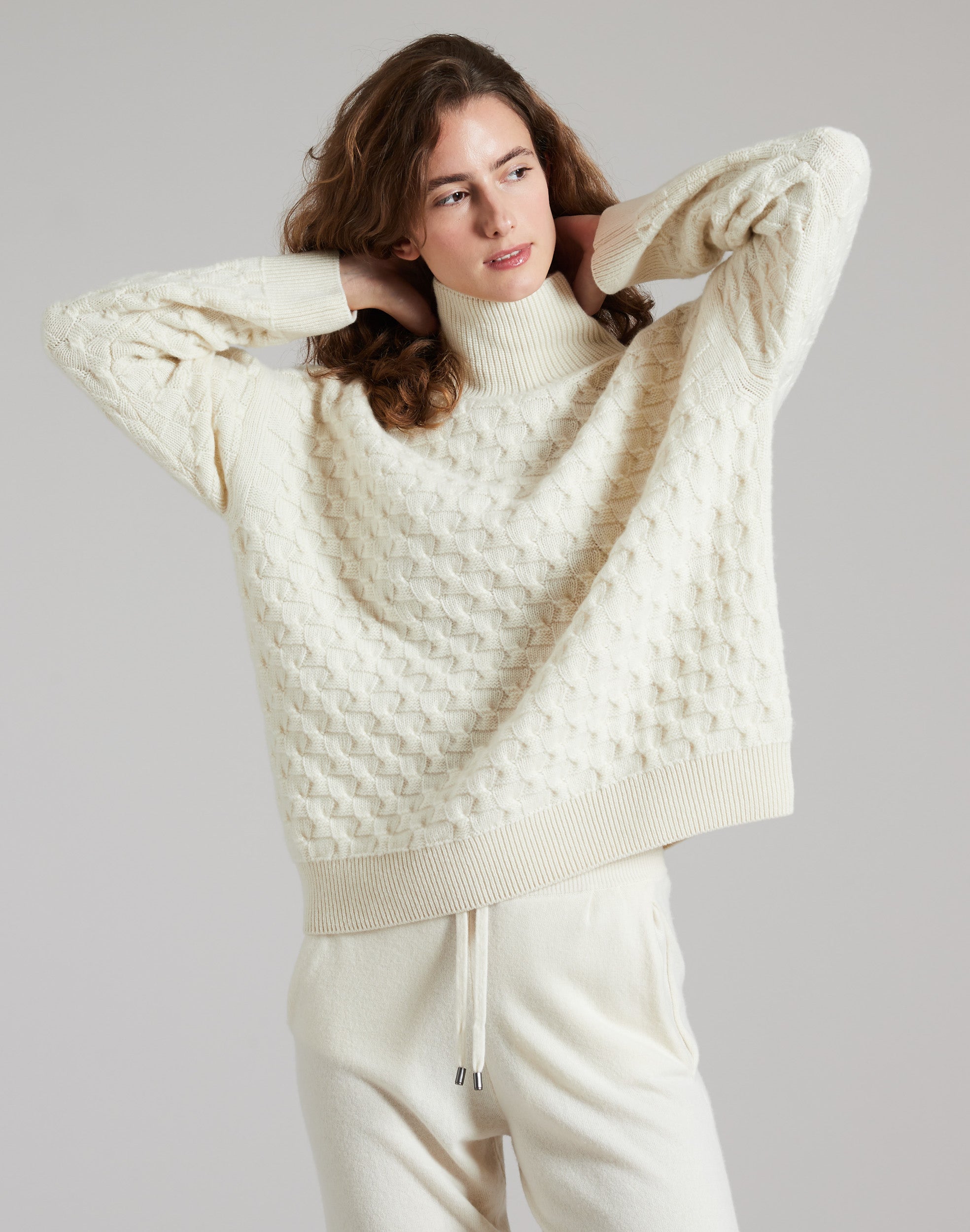 White three dimensional turtle-neck sweater in kid cashmere