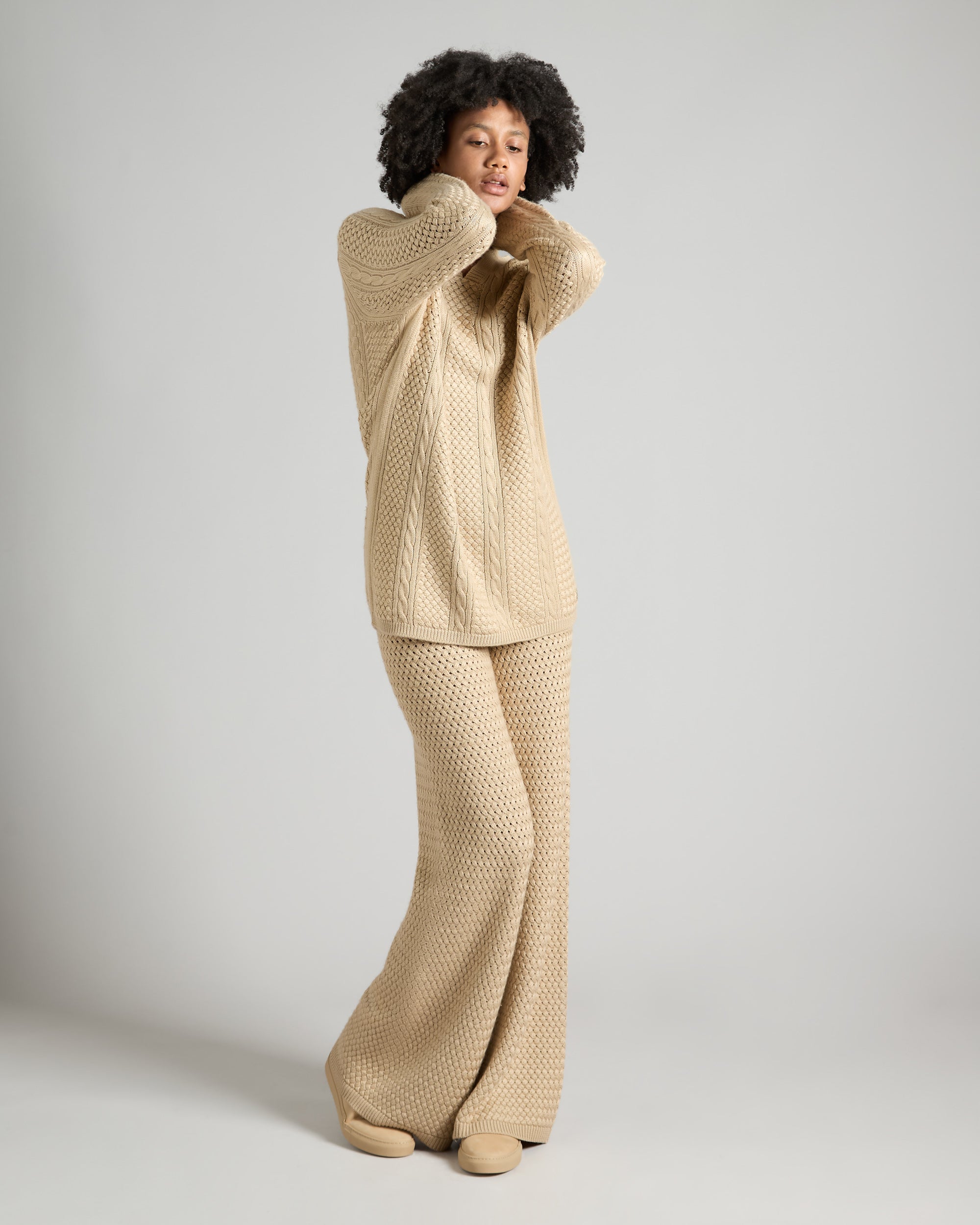 Knitted cashmere and silk sweater with an interwoven stitch