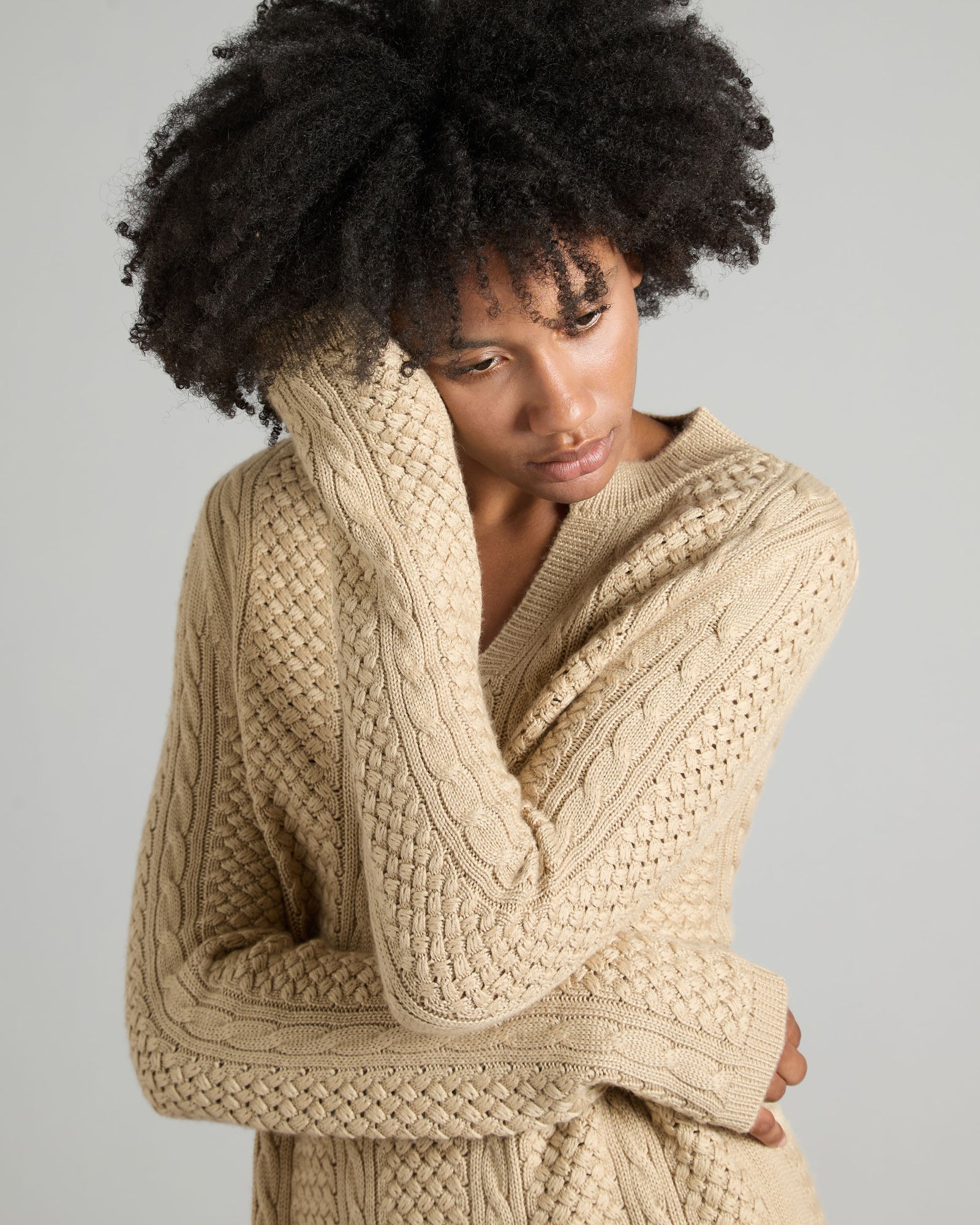 Knitted cashmere and silk sweater with an interwoven stitch